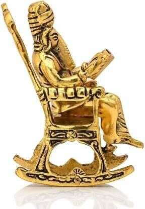 Golden Lord Ganesha Statue Sitting On A Rocking Chair And Reading Ramayan Showpiece Mystical9